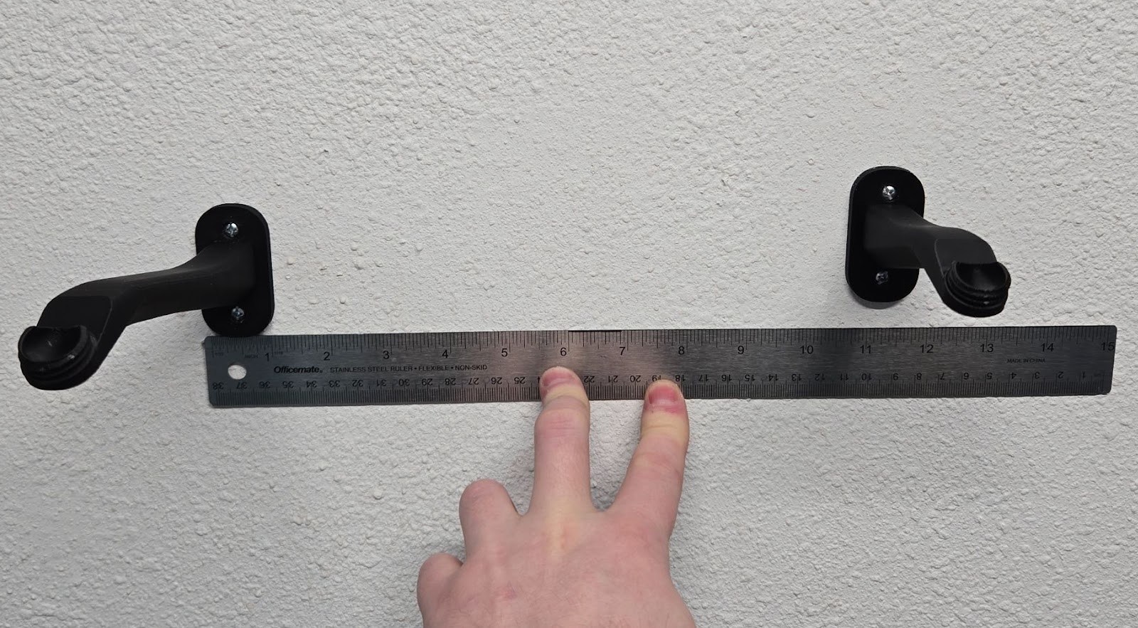 Level the base and mark both wall plates